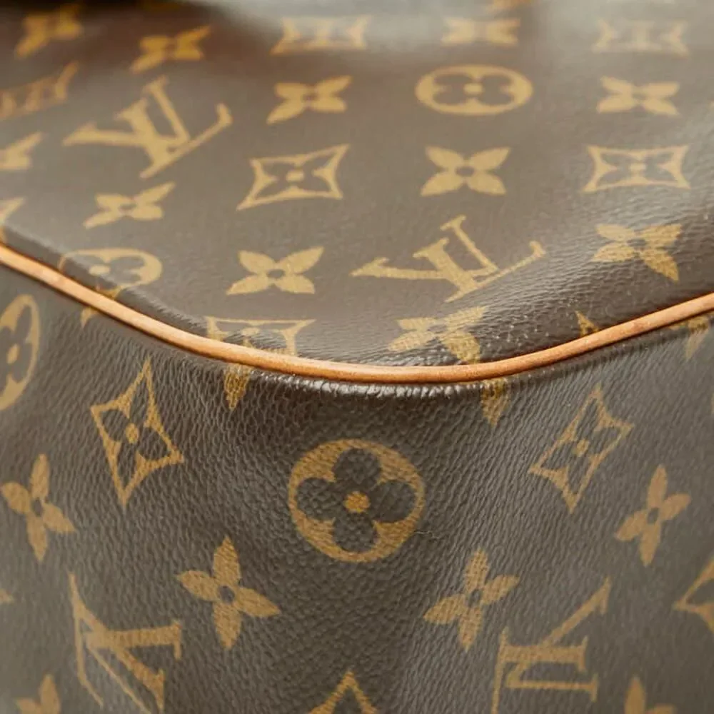 Louis Vuitton Monogram Exantry Cite Handbag